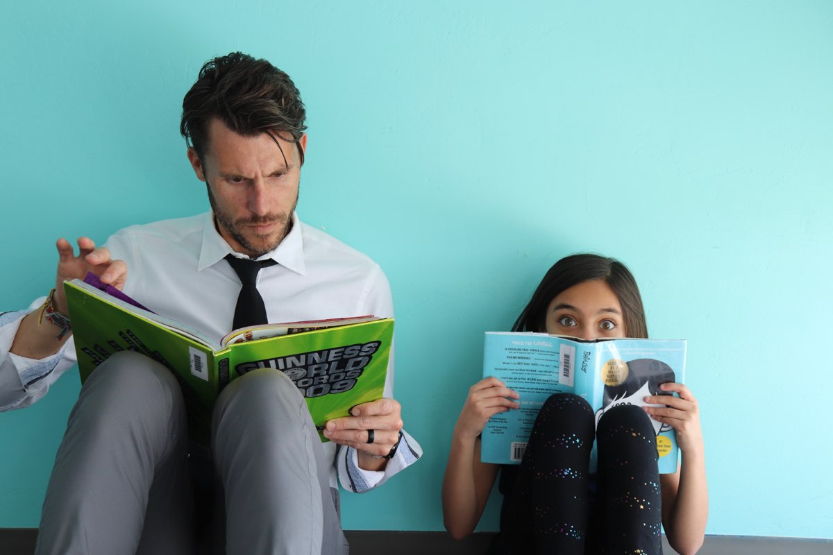 teacher-student-reading-2 teacher-student-reading-2